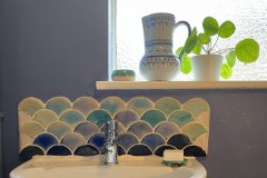 Cloakroom sink splashback, fishscales, blue-turquoise mix