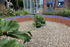 Garden wall made with frostproof glossy vivid porcelain tiles